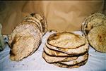Unleavened bread are baked in a special oven for Kosher for Passover matzos