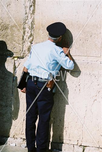 Prayer with tefilin near the kotel