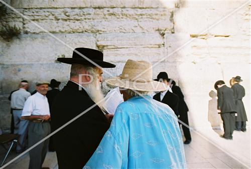 Prayer with tefilin near the kotel