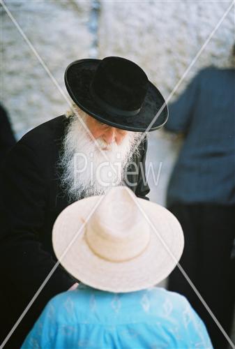 Prayer with tefilin near the kotel