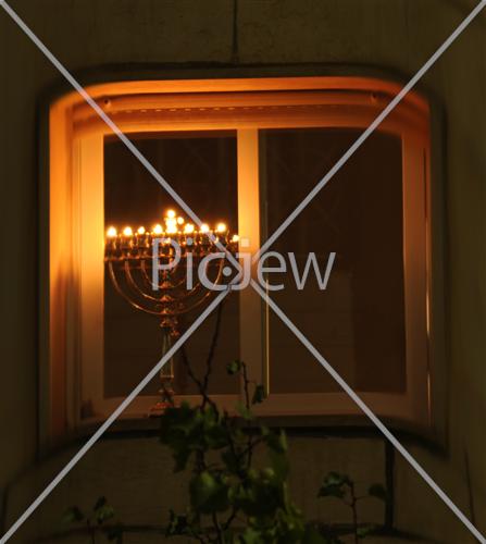 Chanuka lights on the window