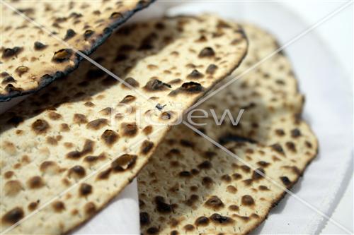 Hand matza in a silk covering