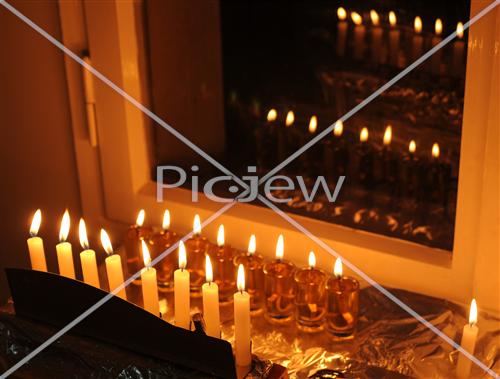 Chanuka lights on the window