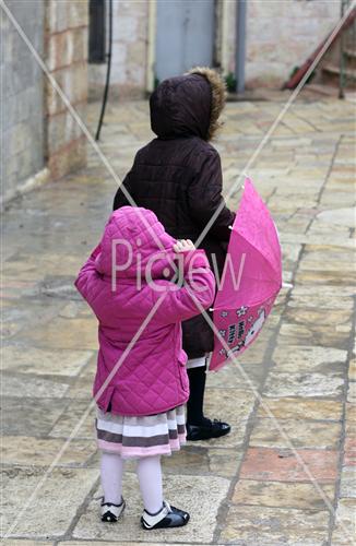 Children in the rain