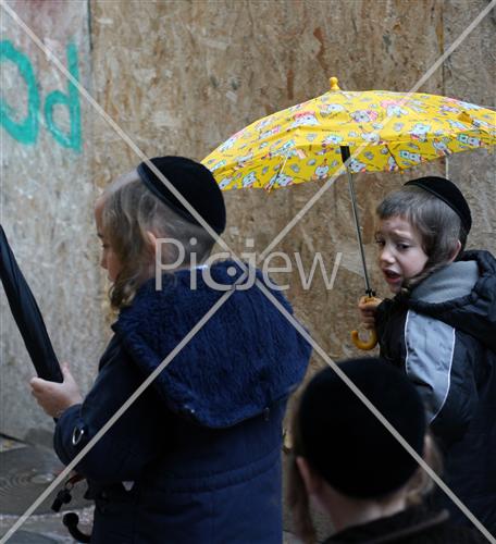 Children in the rain