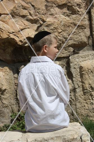 a boy in the wall