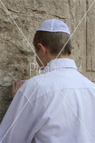 a boy in the wall