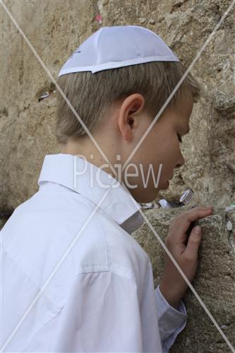 a boy in the wall