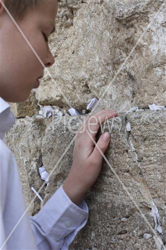 a boy in the wall