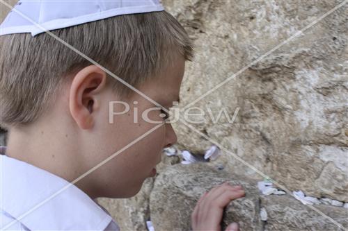 a boy in the wall