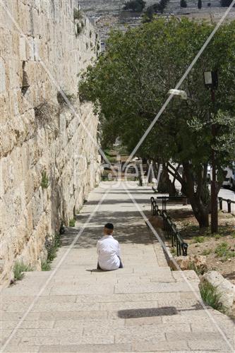 a boy in the wall