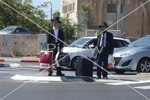Guys are going to yeshiva