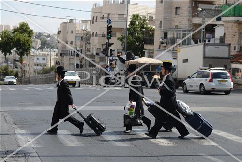 Guys are going to yeshiva