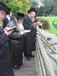 The Rebbe and Chassidim do Tashlich for the Day of Atonement