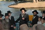 The Rebbe and Chassidim do Tashlich for the Day of Atonement