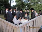 The Rebbe and Chassidim do Tashlich for the Day of Atonement