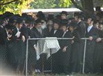 The Rebbe and Chassidim do Tashlich for the Day of Atonement