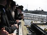 The Rebbe and Chassidim do Tashlich for the Day of Atonement