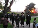 The Rebbe and Chassidim do Tashlich for the Day of Atonement