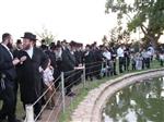 The Rebbe and Chassidim do Tashlich for the Day of Atonement