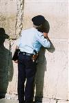 Prayer with tefilin near the kotel