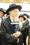 Sefer Torah at Kol Ya&#39;akov in the Bait Vagan in Jerusalem, headed by Rabbi Yehudah Ades