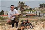 Jews burn leavened bread on Passover eve in the Upper Galilee town of Safed