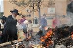 Jews burn leavened bread on Passover eve in the Upper Galilee town of Safed