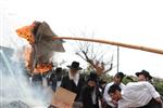 Jews burn leavened bread on Passover eve in the Upper Galilee town of Safed