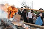 Jews burn leavened bread on Passover eve in the Upper Galilee town of Safed