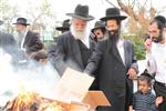 Jews burn leavened bread on Passover eve in the Upper Galilee town of Safed