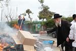 Jews burn leavened bread on Passover eve in the Upper Galilee town of Safed