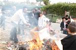 Jews burn leavened bread on Passover eve in the Upper Galilee town of Safed