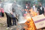 Jews burn leavened bread on Passover eve in the Upper Galilee town of Safed