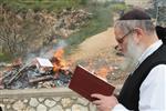 Jews burn leavened bread on Passover eve in the Upper Galilee town of Safed