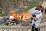 Jews burn leavened bread on Passover eve in the Upper Galilee town of Safed