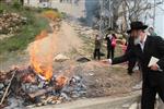 Jews burn leavened bread on Passover eve in the Upper Galilee town of Safed