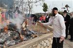 Jews burn leavened bread on Passover eve in the Upper Galilee town of Safed