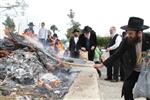 Jews burn leavened bread on Passover eve in the Upper Galilee town of Safed