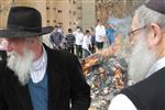 Jews burn leavened bread on Passover eve in the Upper Galilee town of Safed