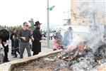 Jews burn leavened bread on Passover eve in the Upper Galilee town of Safed