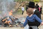 Jews burn leavened bread on Passover eve in the Upper Galilee town of Safed