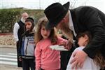 Jews burn leavened bread on Passover eve in the Upper Galilee town of Safed