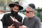 Jews burn leavened bread on Passover eve in the Upper Galilee town of Safed