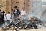 Jews burn leavened bread on Passover eve in the Upper Galilee town of Safed