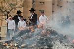 Jews burn leavened bread on Passover eve in the Upper Galilee town of Safed