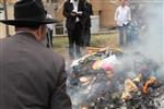 Jews burn leavened bread on Passover eve in the Upper Galilee town of Safed