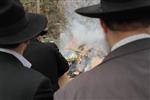 Jews burn leavened bread on Passover eve in the Upper Galilee town of Safed