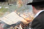 Jews burn leavened bread on Passover eve in the Upper Galilee town of Safed