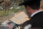 Jews burn leavened bread on Passover eve in the Upper Galilee town of Safed